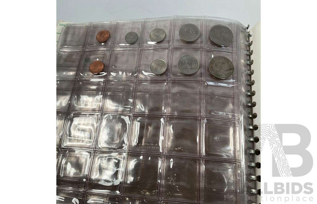 Album of International Vintage Coins Including USA, Fiji, New Zealand, Canada, Germany, Hong Kong, India, Malaysia, Tonga and More