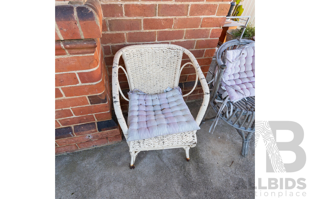 Pair of Unmatched Verandah Chairs Including a Seagrass and Bent Cane Example