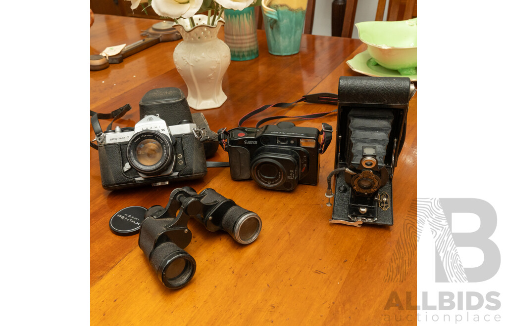 Pentax Spotmatic SLR Camera with Folding Brownie Camera and a Pair of Binoculars