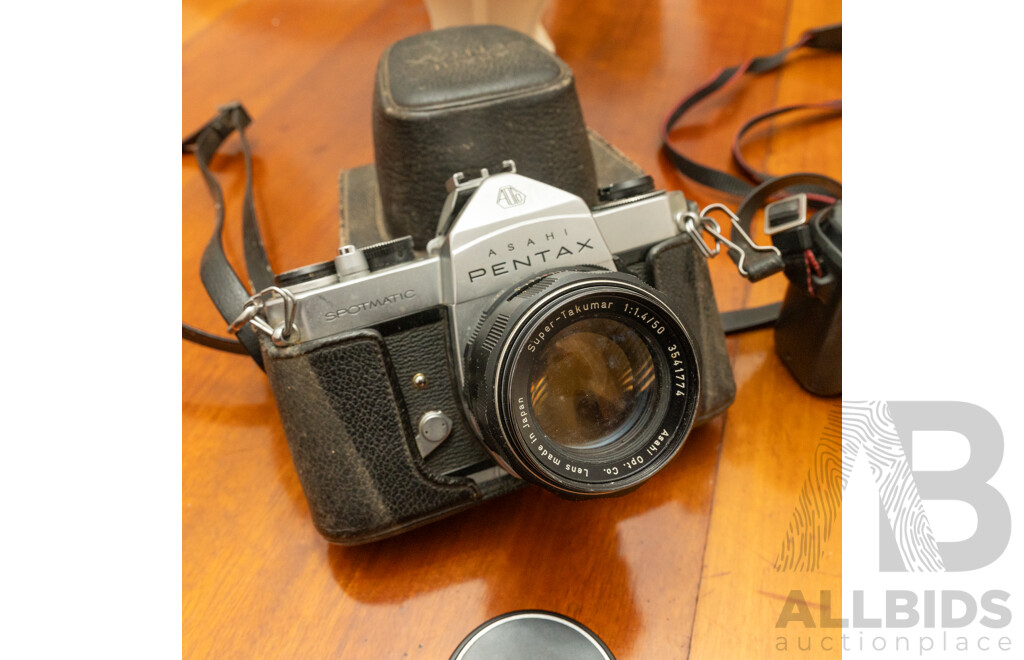 Pentax Spotmatic SLR Camera with Folding Brownie Camera and a Pair of Binoculars