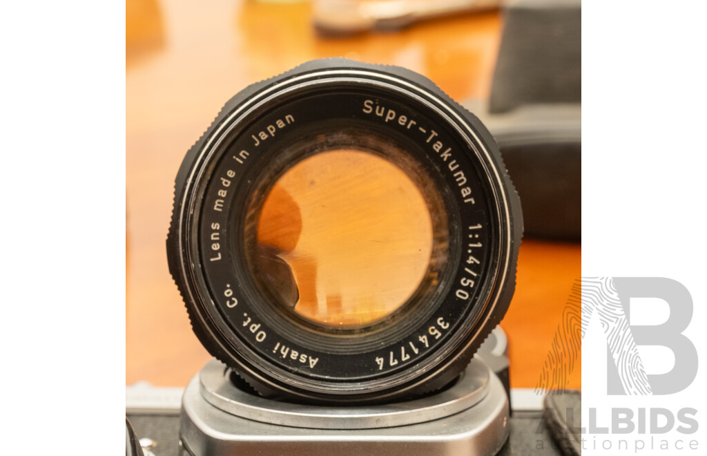 Pentax Spotmatic SLR Camera with Folding Brownie Camera and a Pair of Binoculars