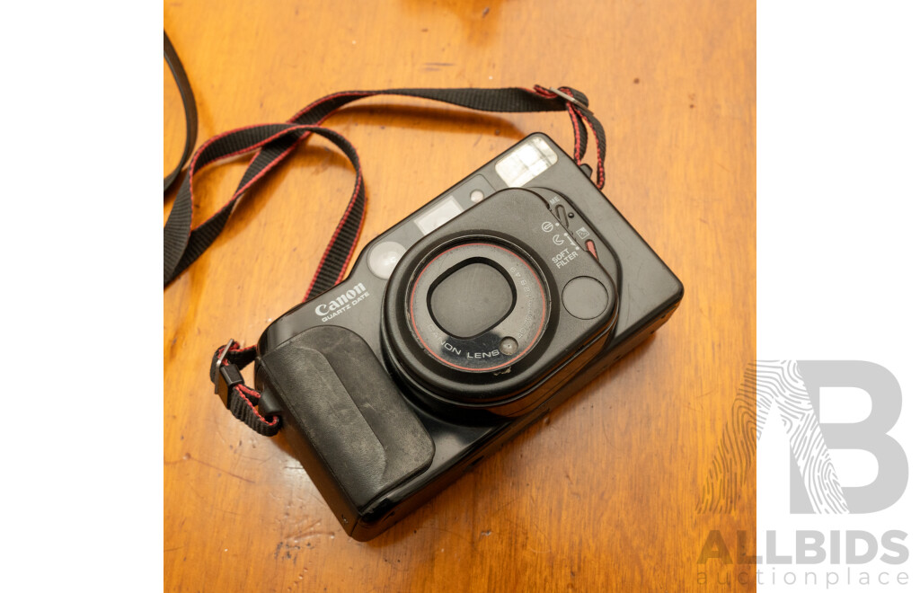Pentax Spotmatic SLR Camera with Folding Brownie Camera and a Pair of Binoculars