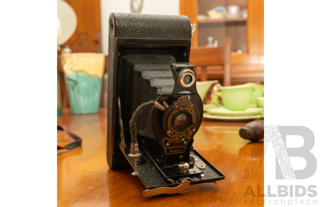 Pentax Spotmatic SLR Camera with Folding Brownie Camera and a Pair of Binoculars