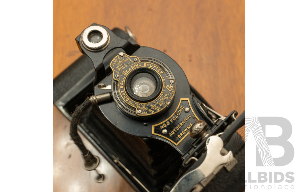 Pentax Spotmatic SLR Camera with Folding Brownie Camera and a Pair of Binoculars