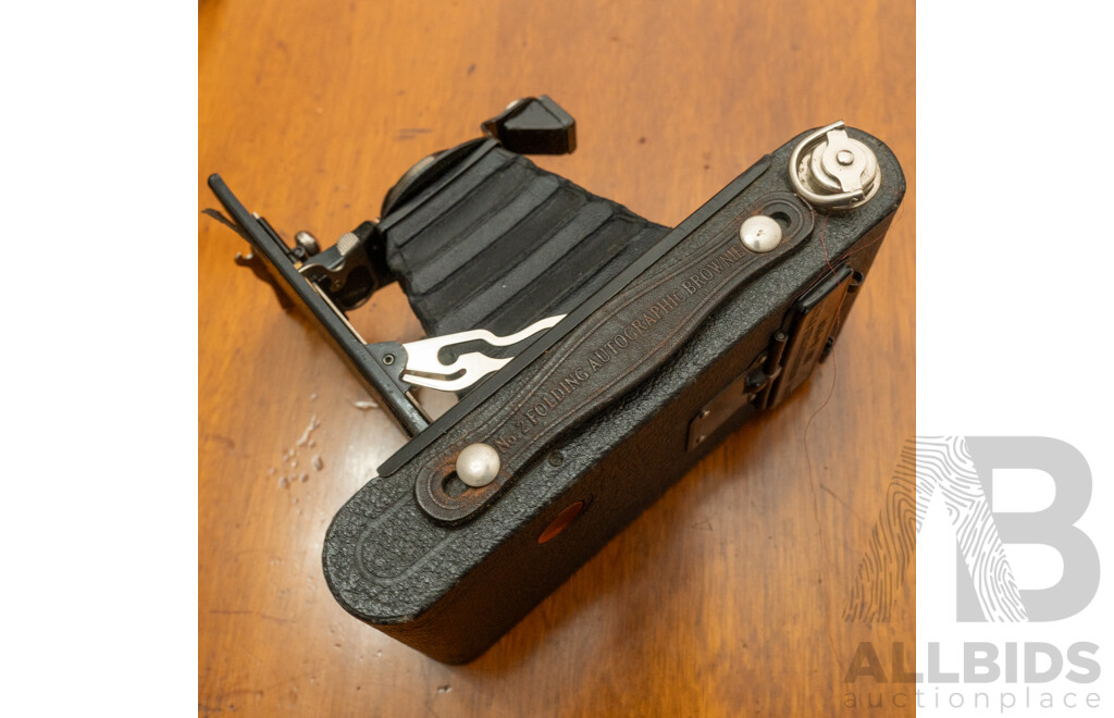 Pentax Spotmatic SLR Camera with Folding Brownie Camera and a Pair of Binoculars