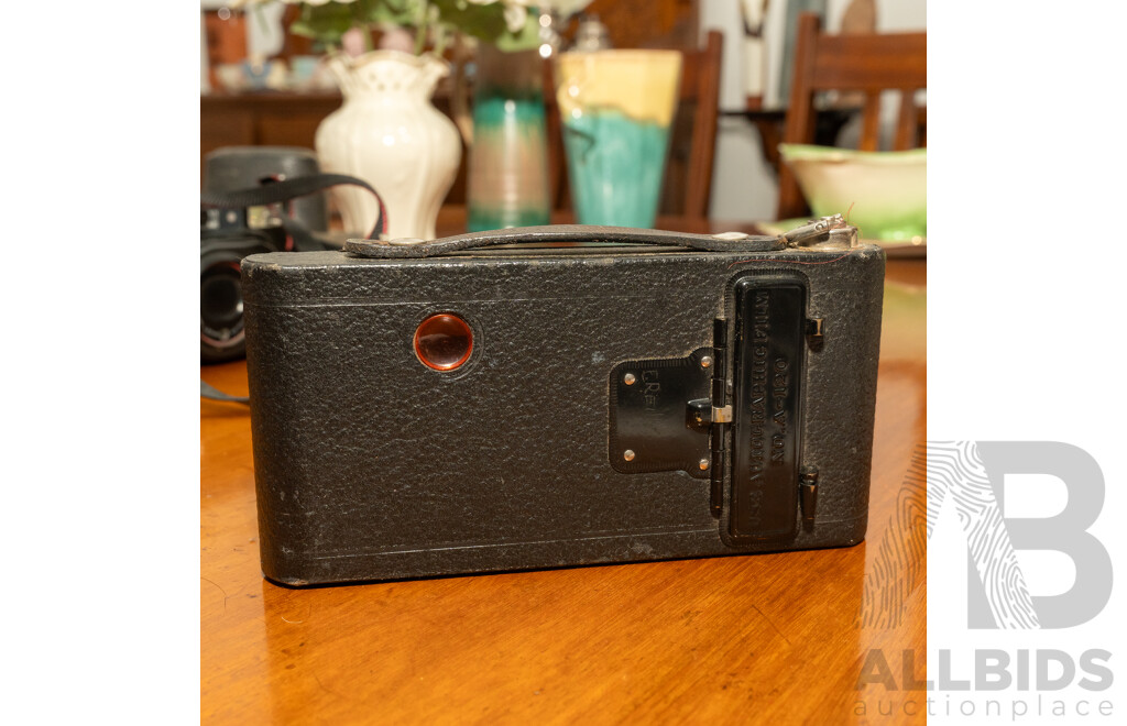 Pentax Spotmatic SLR Camera with Folding Brownie Camera and a Pair of Binoculars