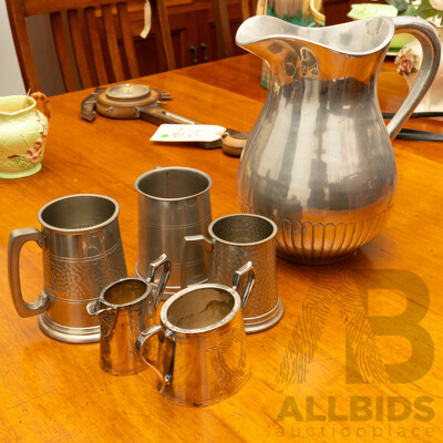 Large Pewter Pitcher with Five Vessels