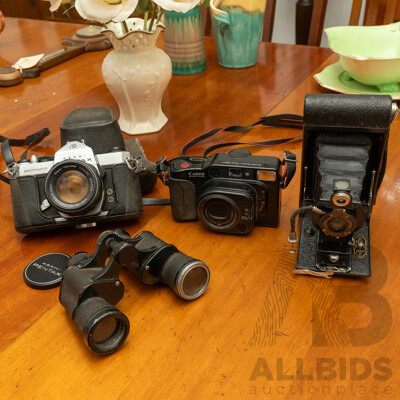 Pentax Spotmatic SLR Camera with Folding Brownie Camera and a Pair of Binoculars