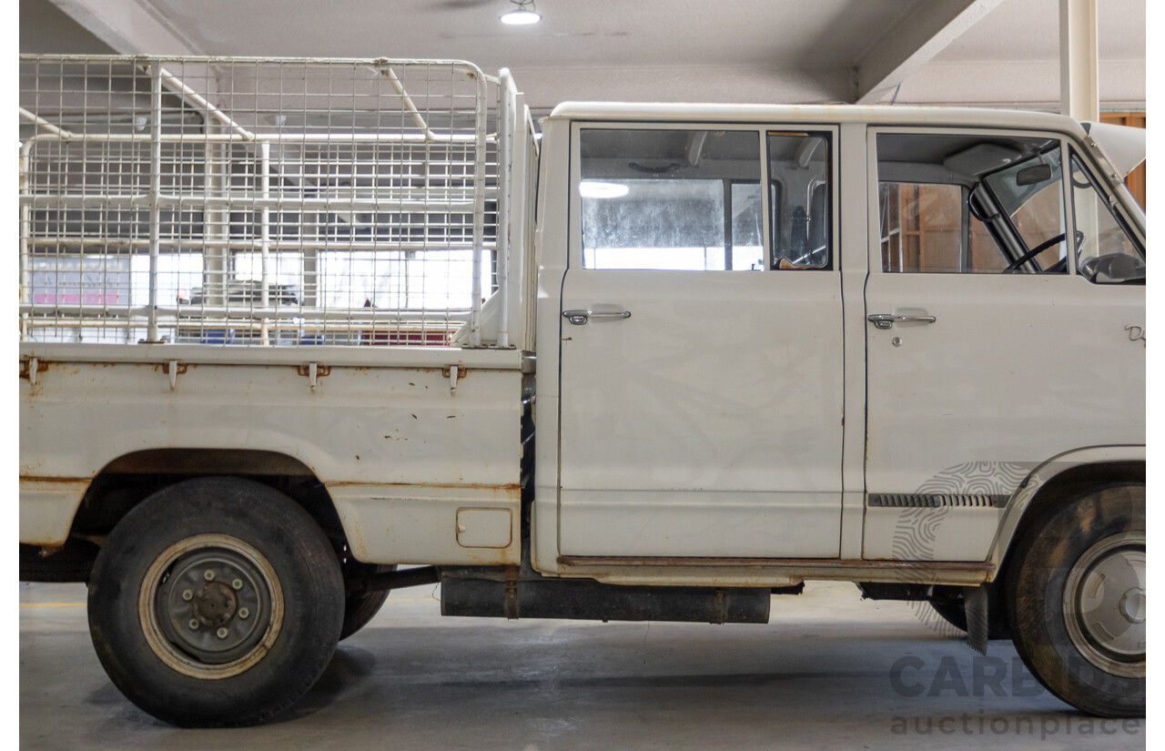 3/1977 Toyota Dyna 4d Tray Back Solid White 2.0L