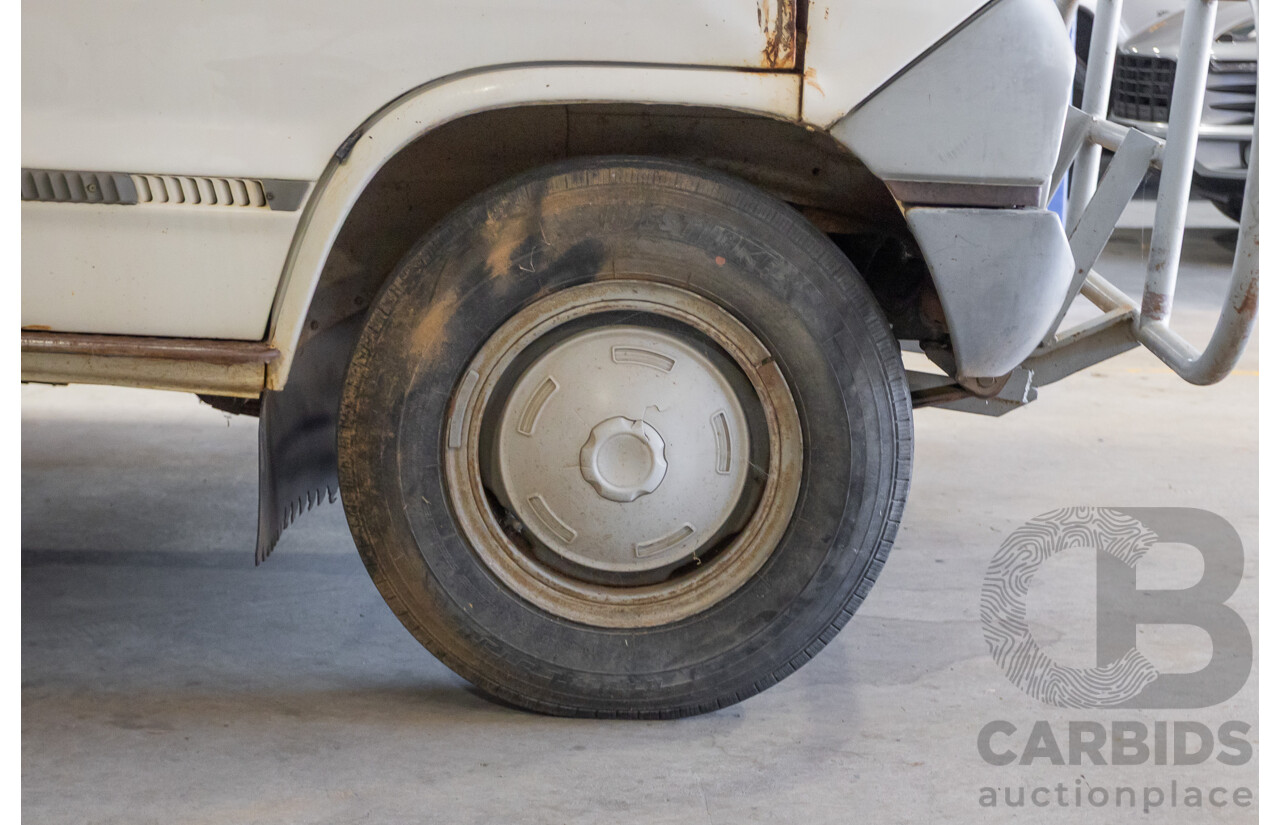 3/1977 Toyota Dyna 4d Tray Back Solid White 2.0L