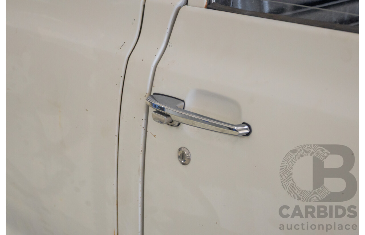 3/1977 Toyota Dyna 4d Tray Back Solid White 2.0L