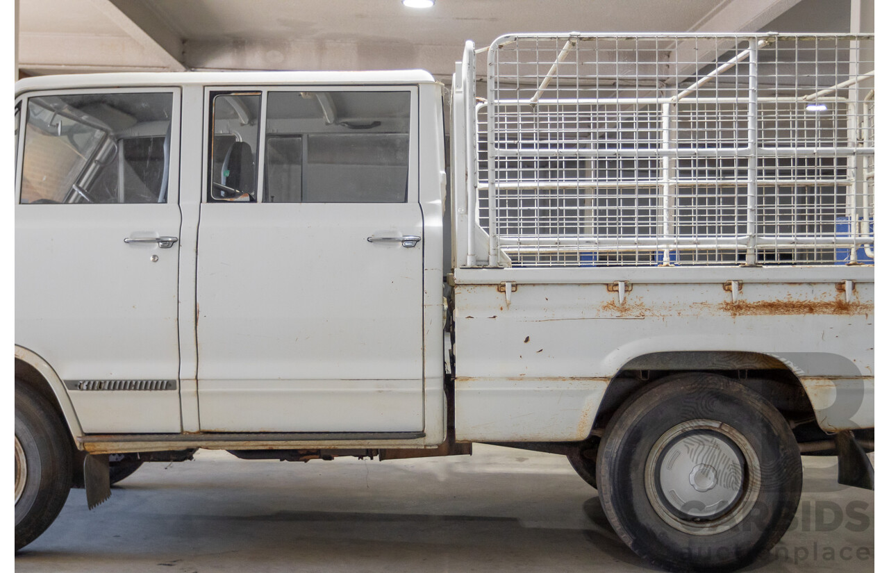 3/1977 Toyota Dyna 4d Tray Back Solid White 2.0L