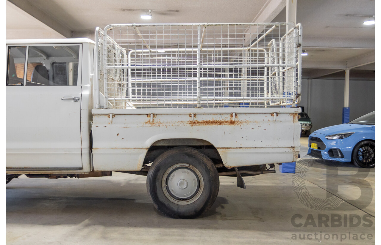 3/1977 Toyota Dyna 4d Tray Back Solid White 2.0L