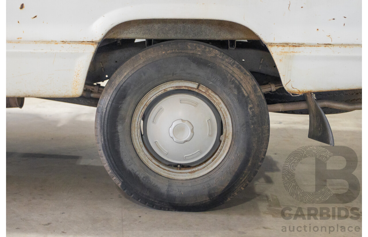 3/1977 Toyota Dyna 4d Tray Back Solid White 2.0L