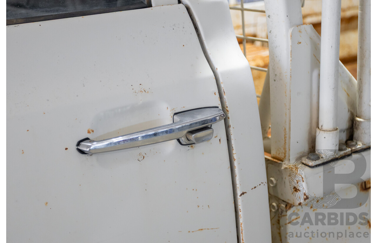 3/1977 Toyota Dyna 4d Tray Back Solid White 2.0L