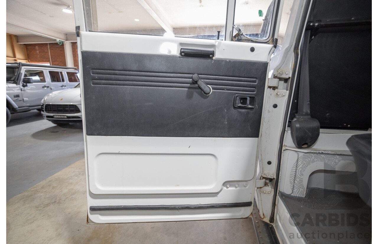 3/1977 Toyota Dyna 4d Tray Back Solid White 2.0L