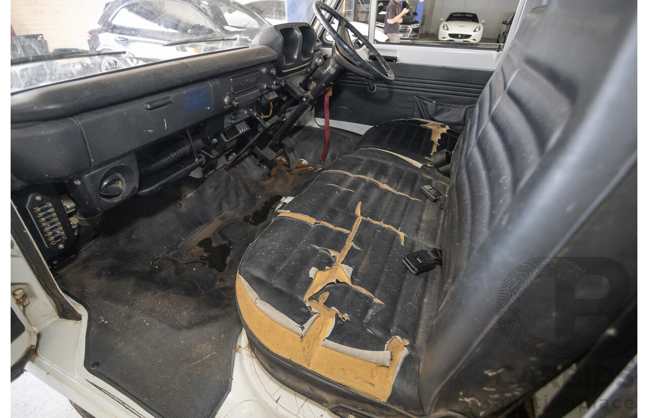 3/1977 Toyota Dyna 4d Tray Back Solid White 2.0L