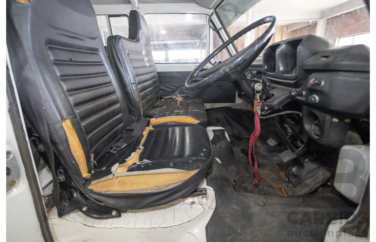 3/1977 Toyota Dyna 4d Tray Back Solid White 2.0L