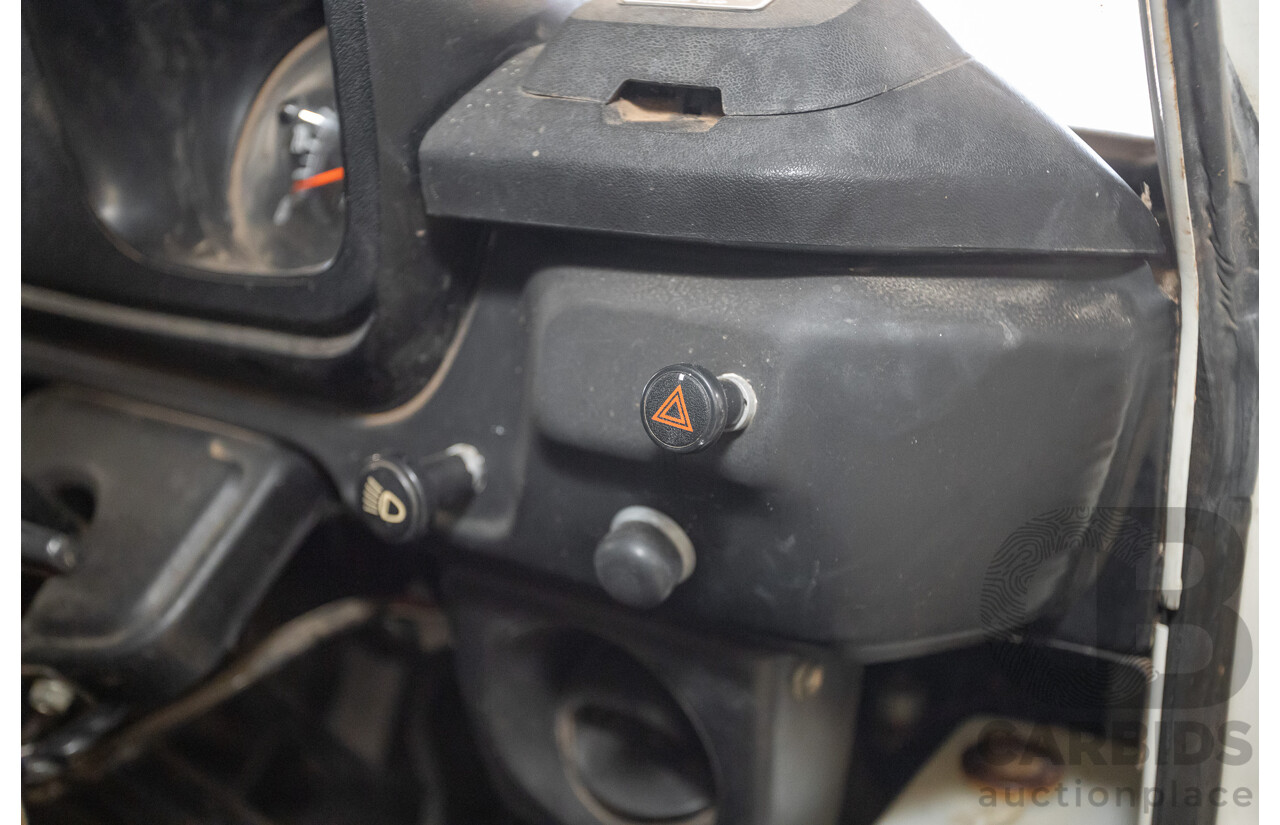 3/1977 Toyota Dyna 4d Tray Back Solid White 2.0L