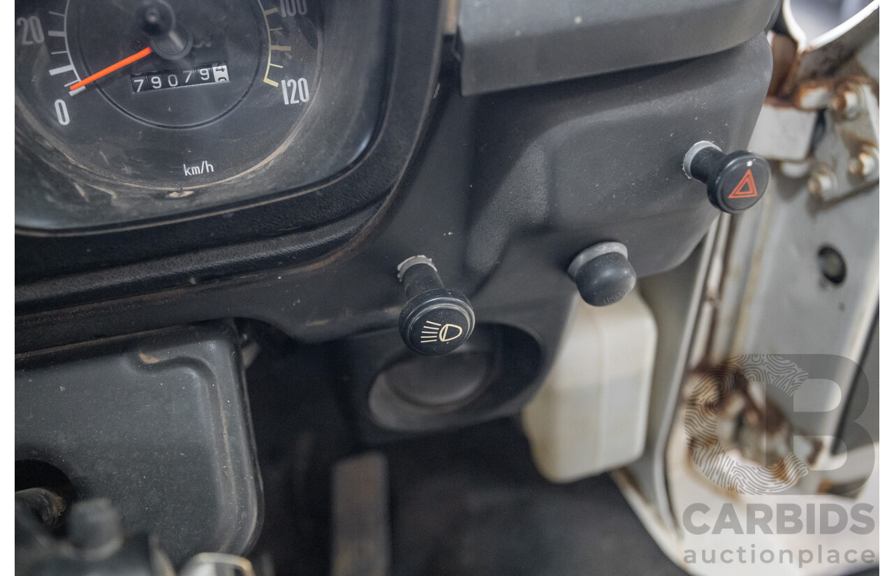 3/1977 Toyota Dyna 4d Tray Back Solid White 2.0L