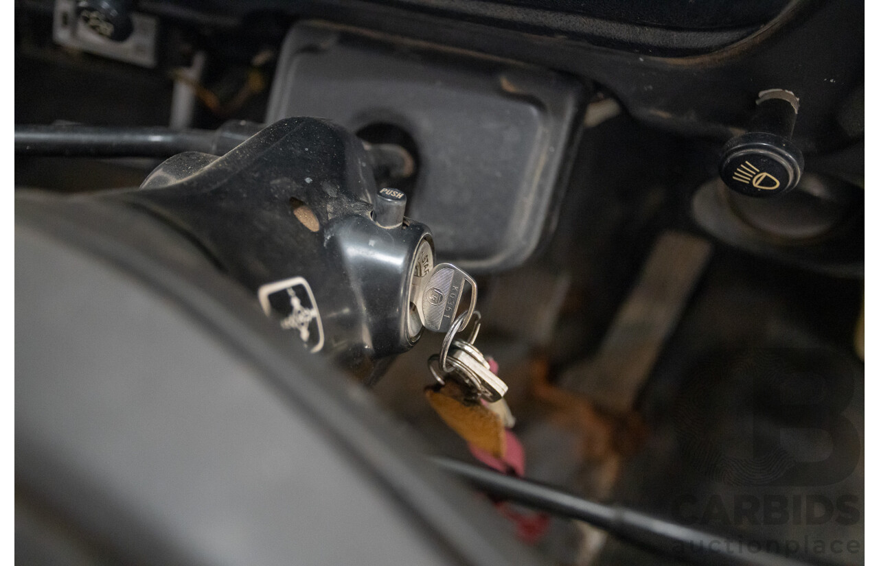 3/1977 Toyota Dyna 4d Tray Back Solid White 2.0L