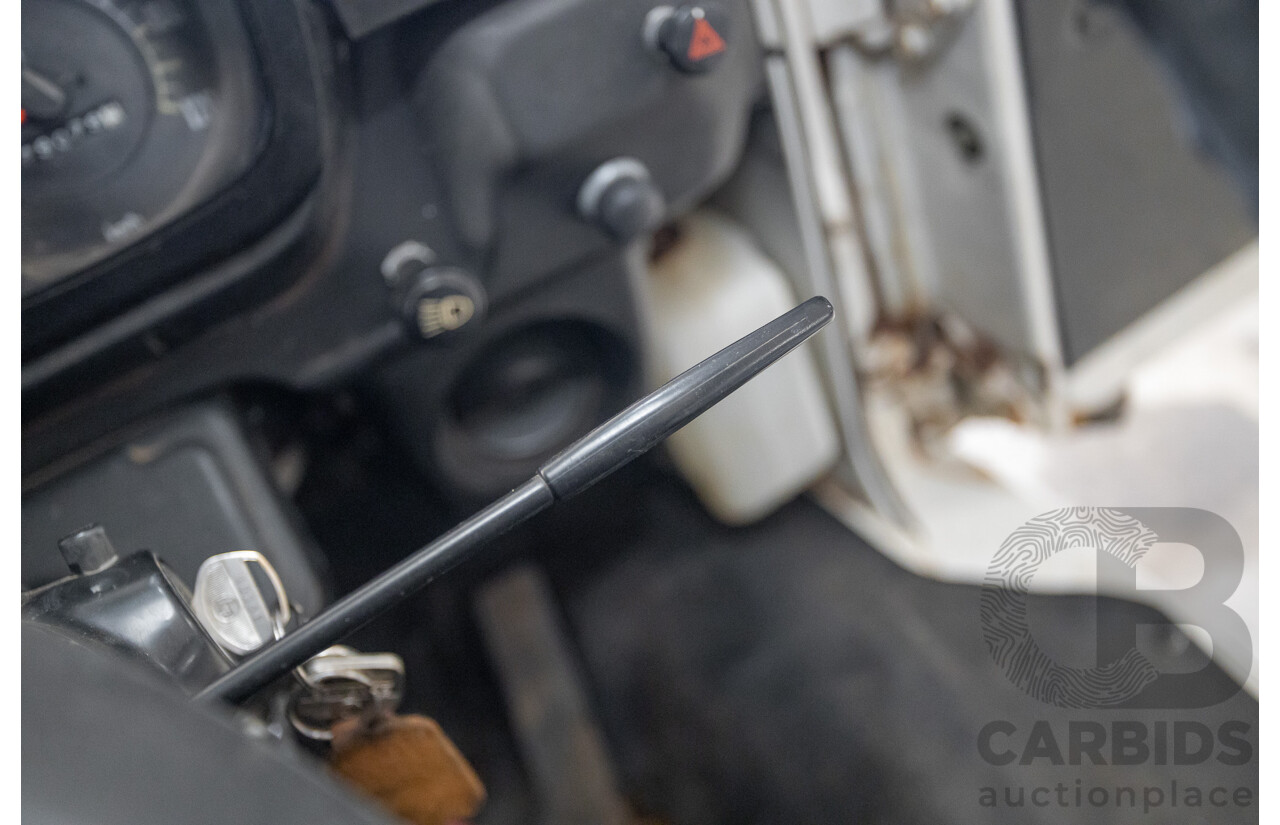 3/1977 Toyota Dyna 4d Tray Back Solid White 2.0L