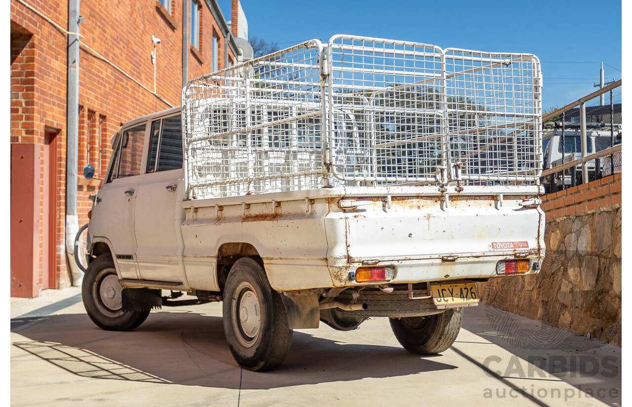 3/1977 Toyota Dyna 4d Tray Back Solid White 2.0L