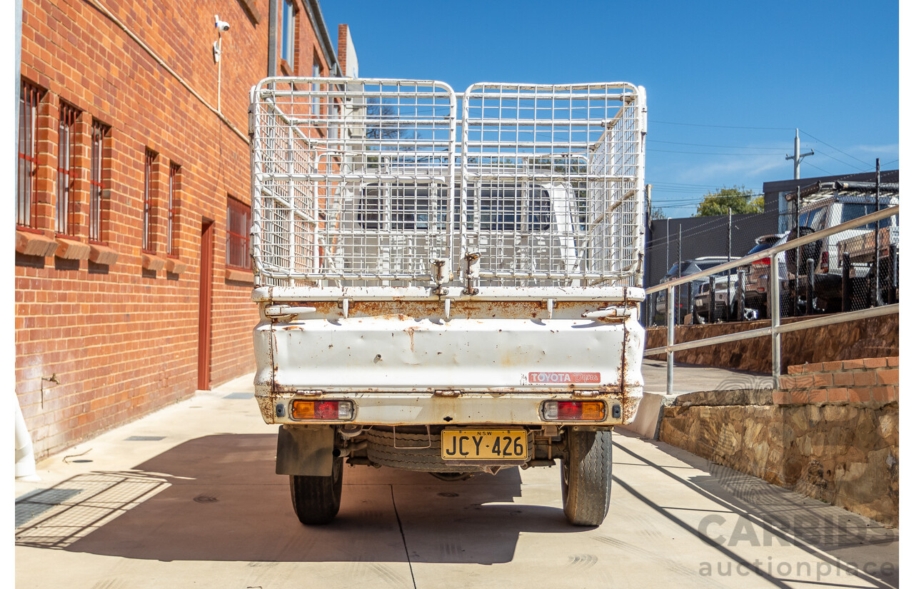 3/1977 Toyota Dyna 4d Tray Back Solid White 2.0L