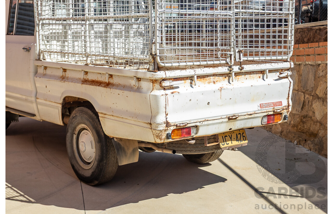 3/1977 Toyota Dyna 4d Tray Back Solid White 2.0L
