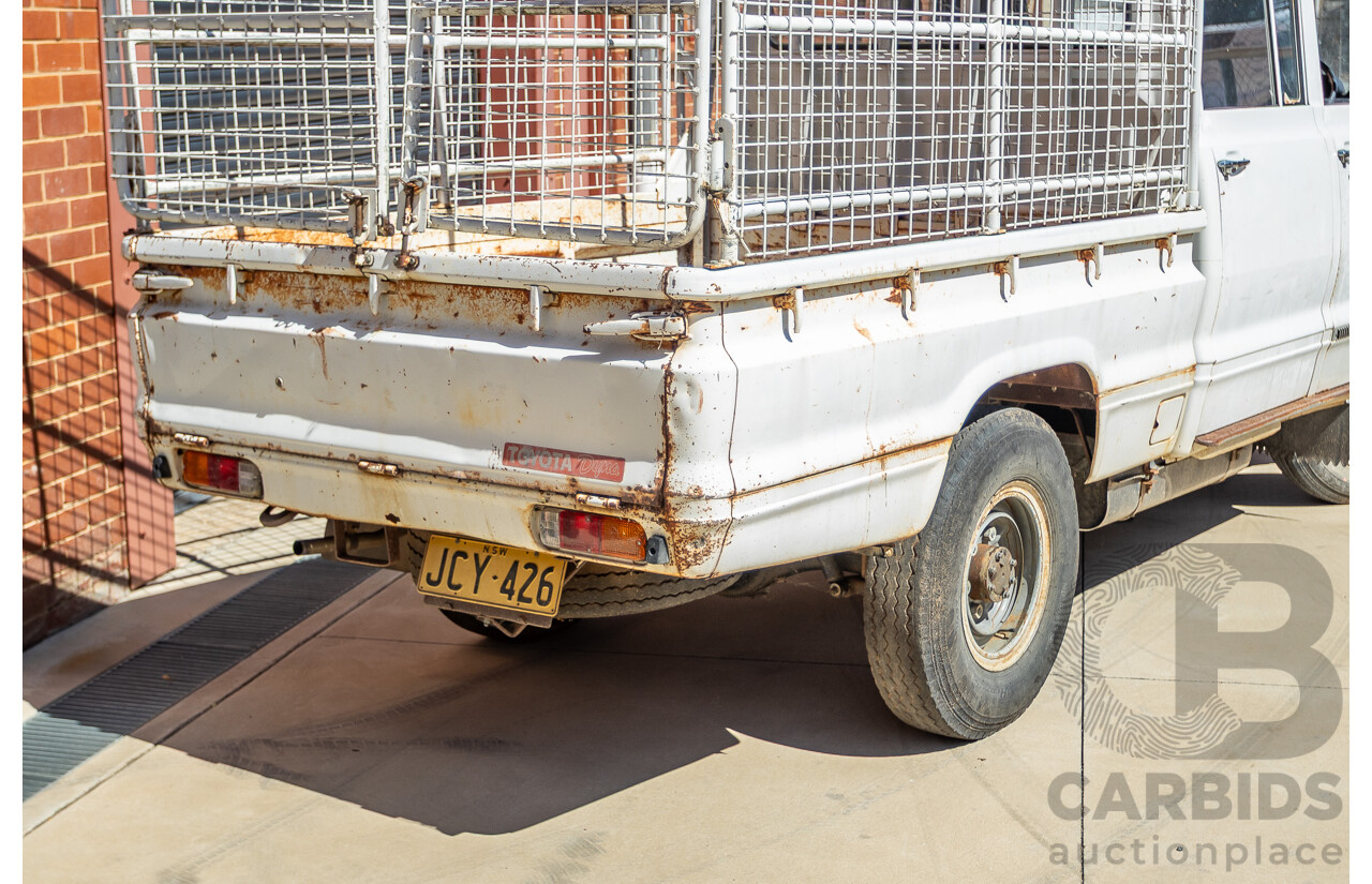 3/1977 Toyota Dyna 4d Tray Back Solid White 2.0L