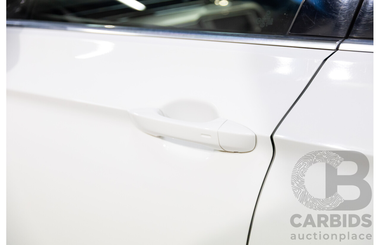 06/2016 Volkswagen Passat 140 TDI Highline (FWD) 3C MY16 4d Sedan Pure White Turbo Diesel 2.0L