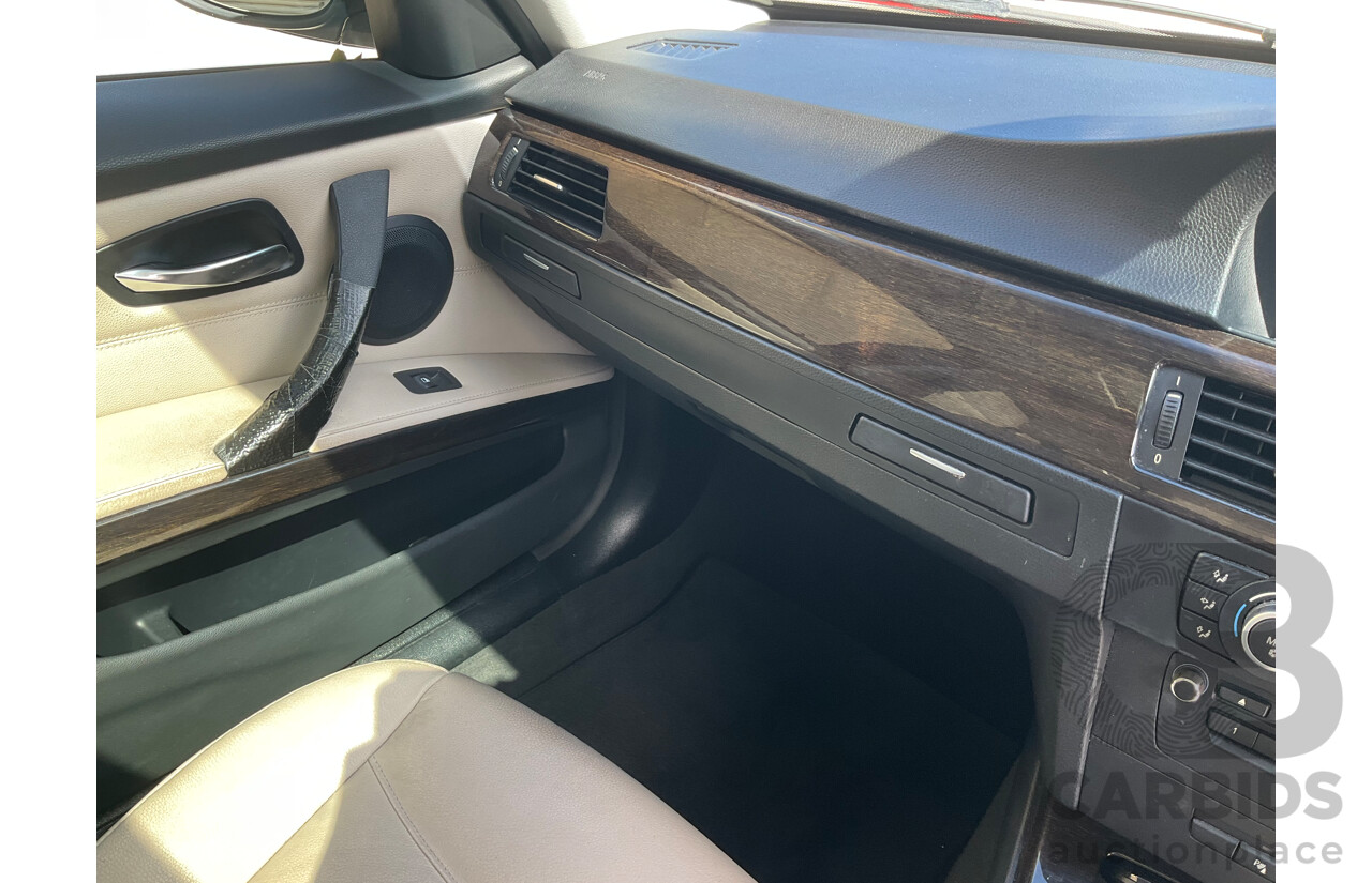 5/2011 BMW 320i E90 MY11 4d Sedan Black 2.0L