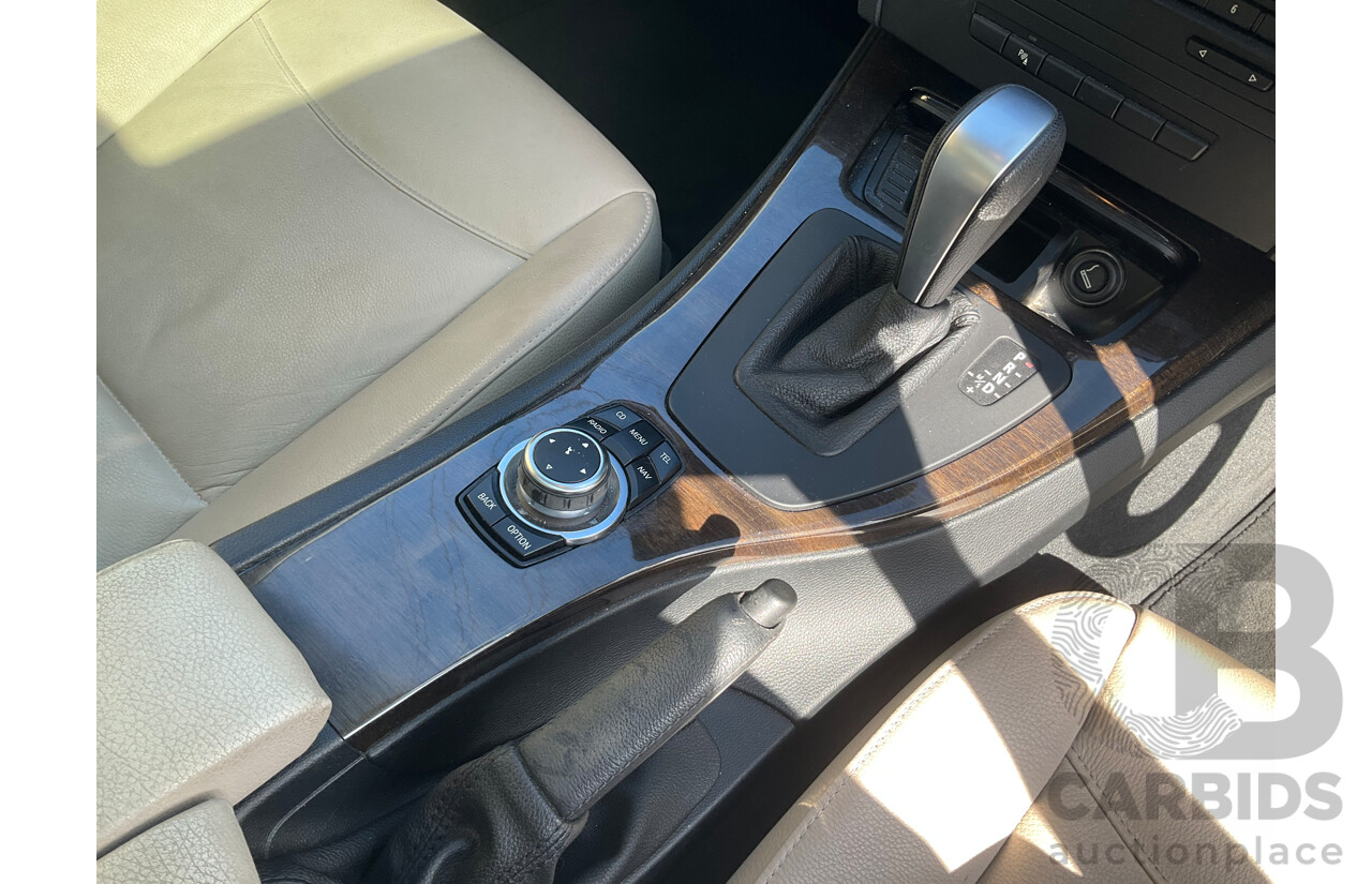 5/2011 BMW 320i E90 MY11 4d Sedan Black 2.0L