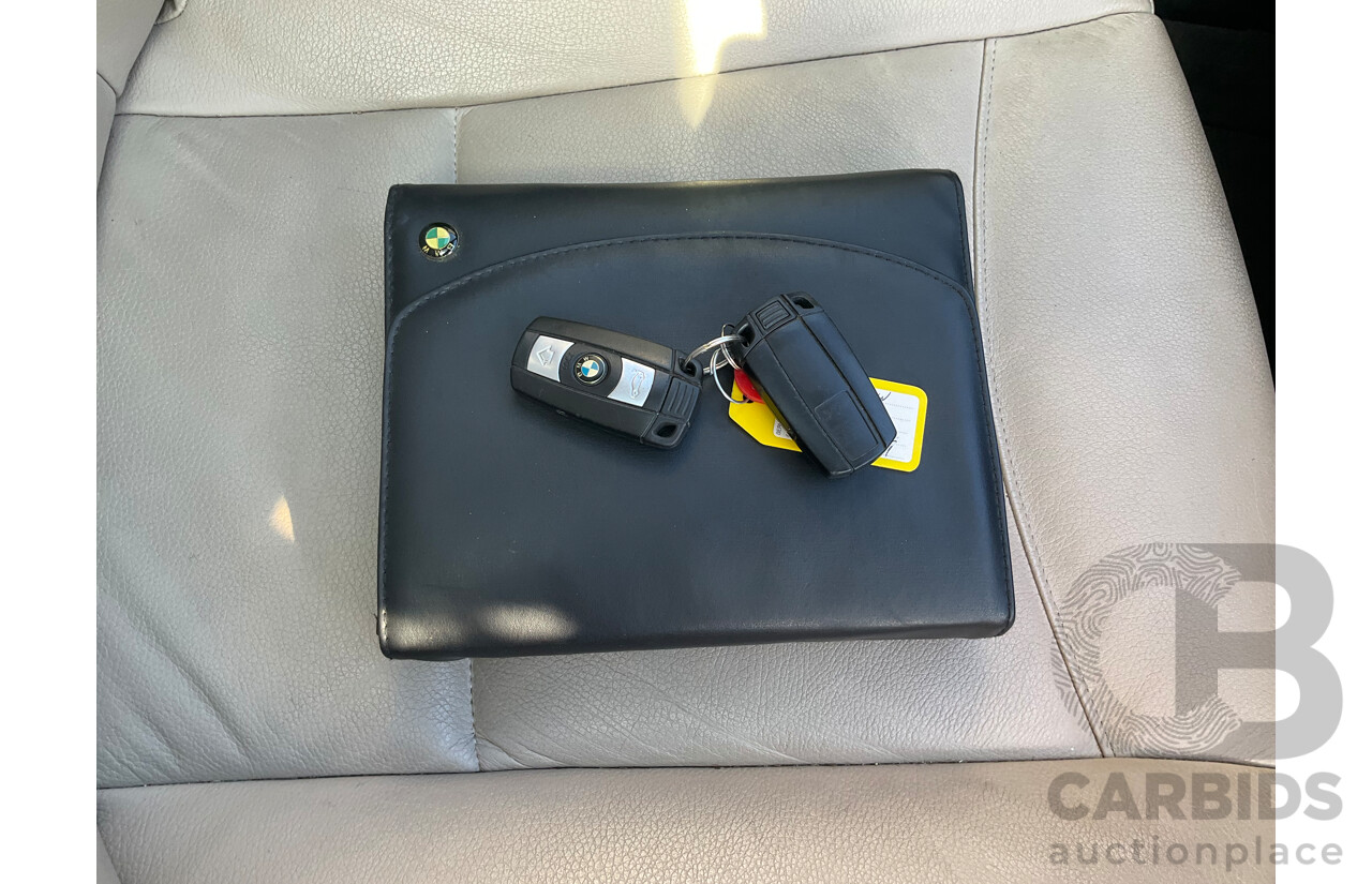 5/2011 BMW 320i E90 MY11 4d Sedan Black 2.0L