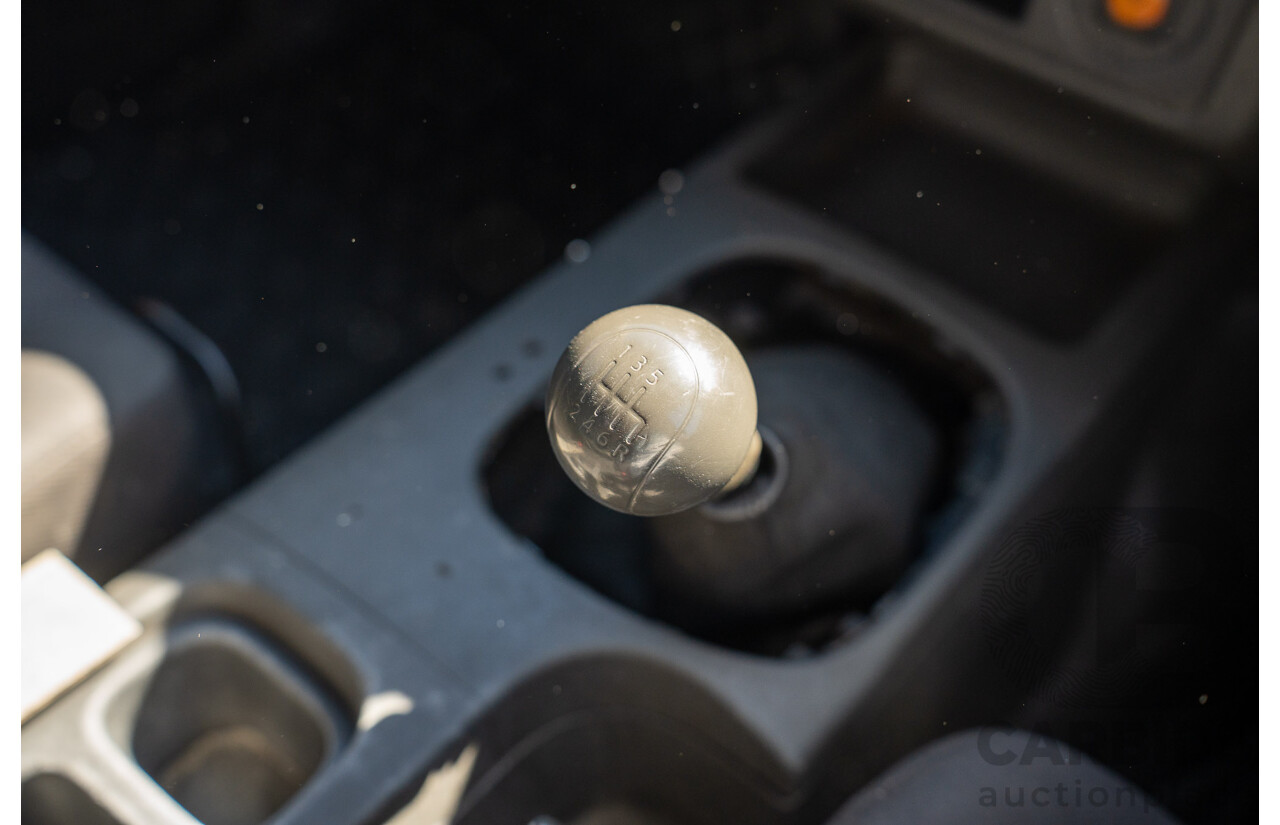 3/2013 Nissan Navara RX (4x2) D40 MY11 Dual Cab P/Up White 2.5L