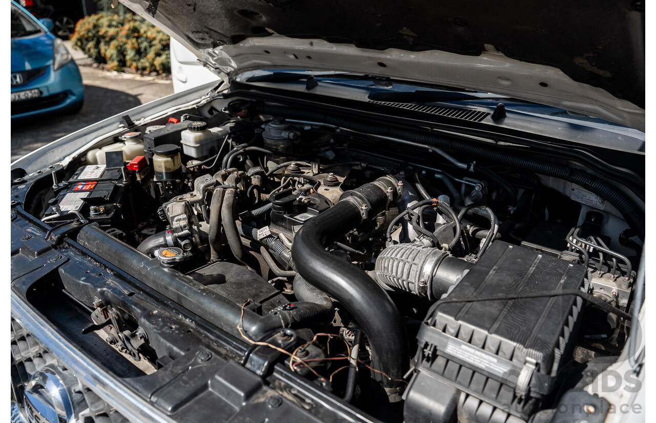 3/2013 Nissan Navara RX (4x2) D40 MY11 Dual Cab P/Up White 2.5L