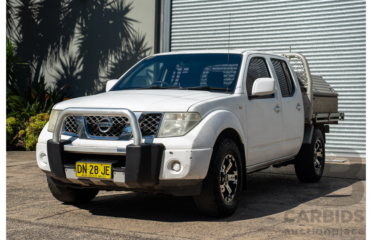 3/2013 Nissan Navara RX (4x2) D40 MY11 Dual Cab P/Up White 2.5L