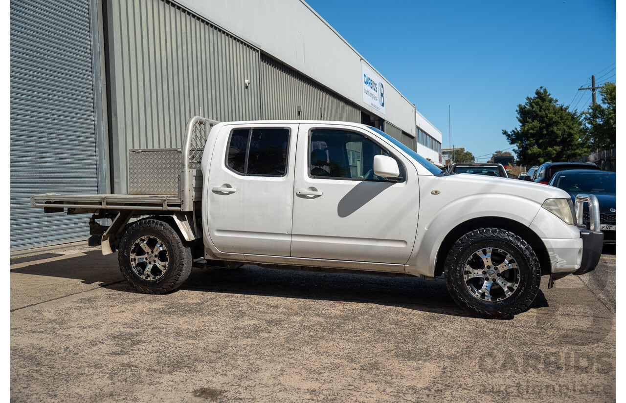 3/2013 Nissan Navara RX (4x2) D40 MY11 Dual Cab P/Up White 2.5L