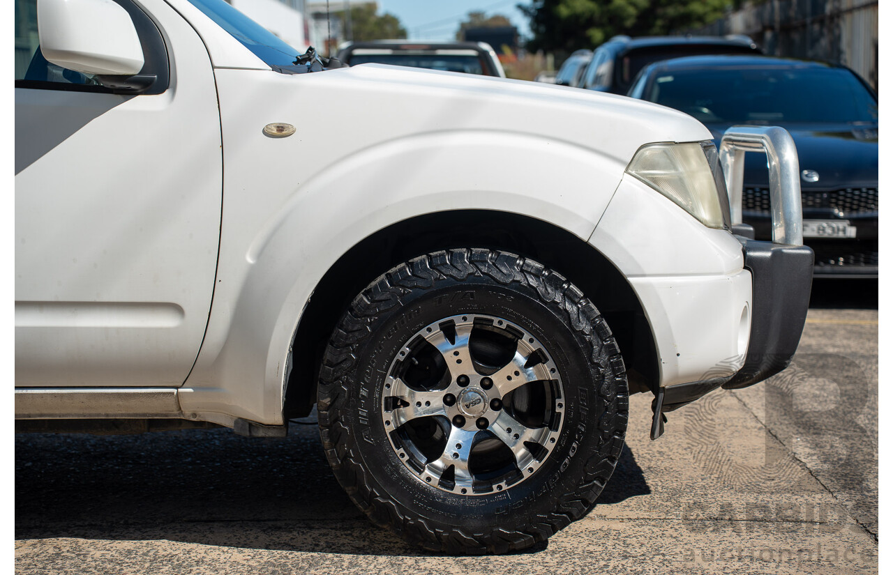 3/2013 Nissan Navara RX (4x2) D40 MY11 Dual Cab P/Up White 2.5L