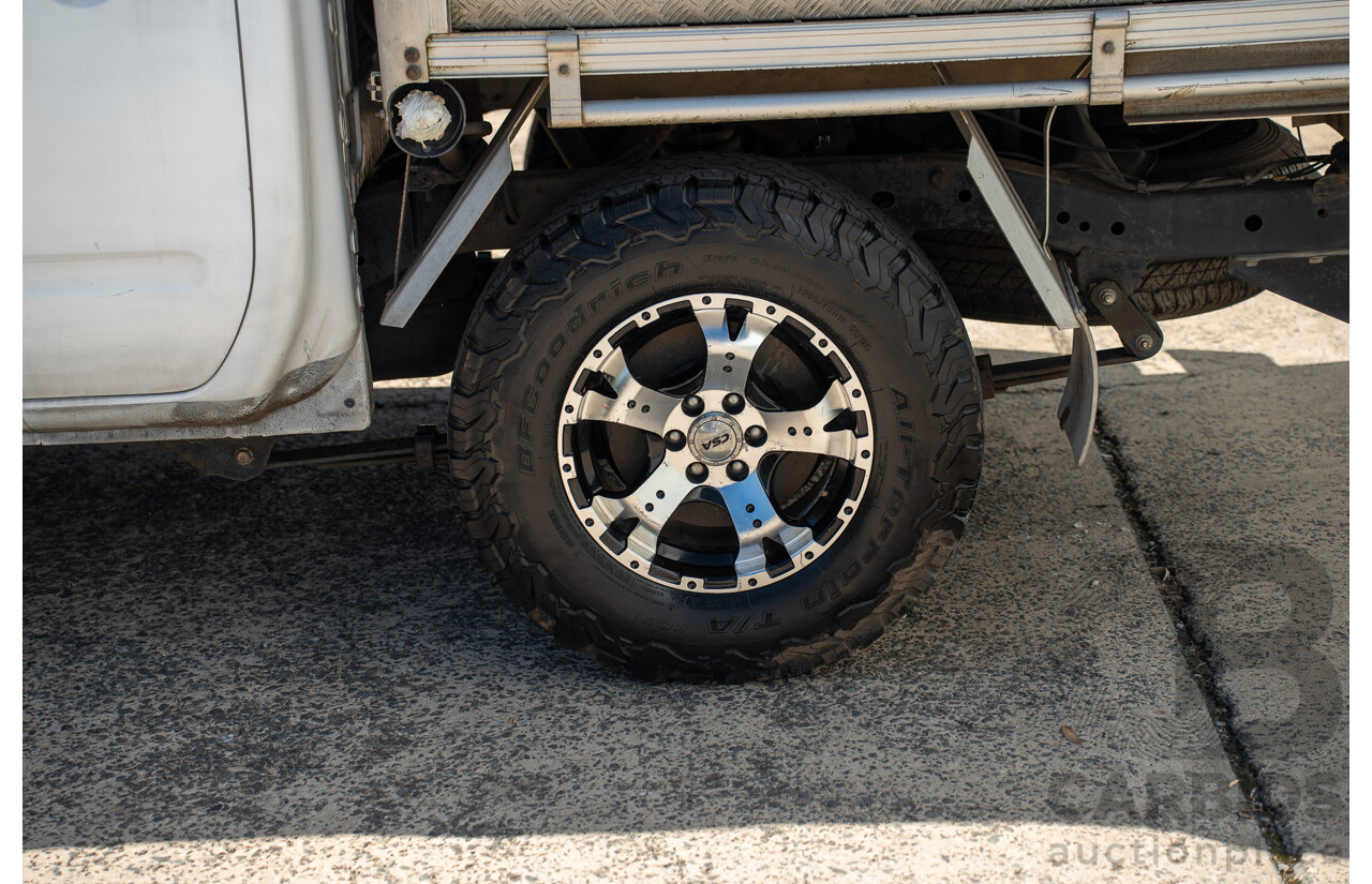 3/2013 Nissan Navara RX (4x2) D40 MY11 Dual Cab P/Up White 2.5L