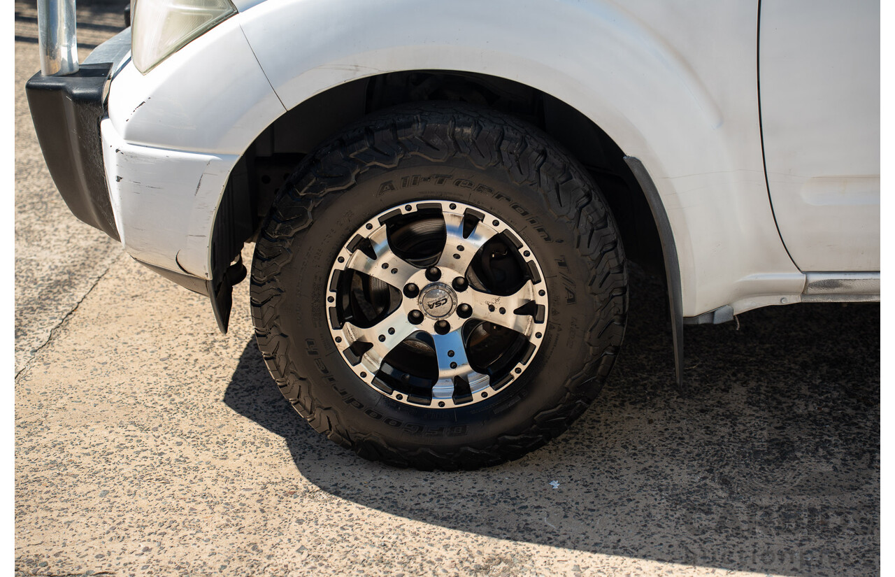 3/2013 Nissan Navara RX (4x2) D40 MY11 Dual Cab P/Up White 2.5L