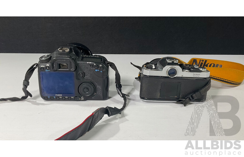 Pair of Cameras and Accessories Including Canon EOS 50D and Nikon FM
