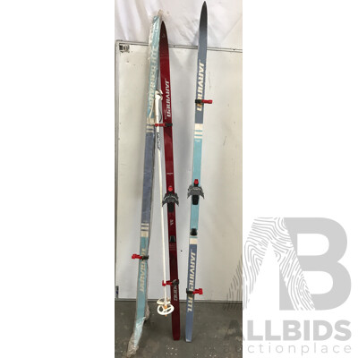 Assorted Jarvinen Skis and Dinsport XL Eskimo Ski Boots