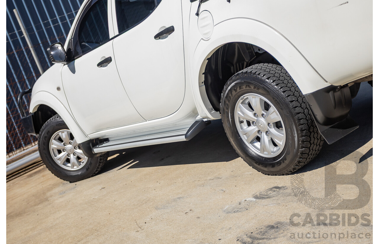 04/2015 Mitsubishi Triton GLX (4x4) MY15 Double Cab Utility White Turbo Diesel 2.5L