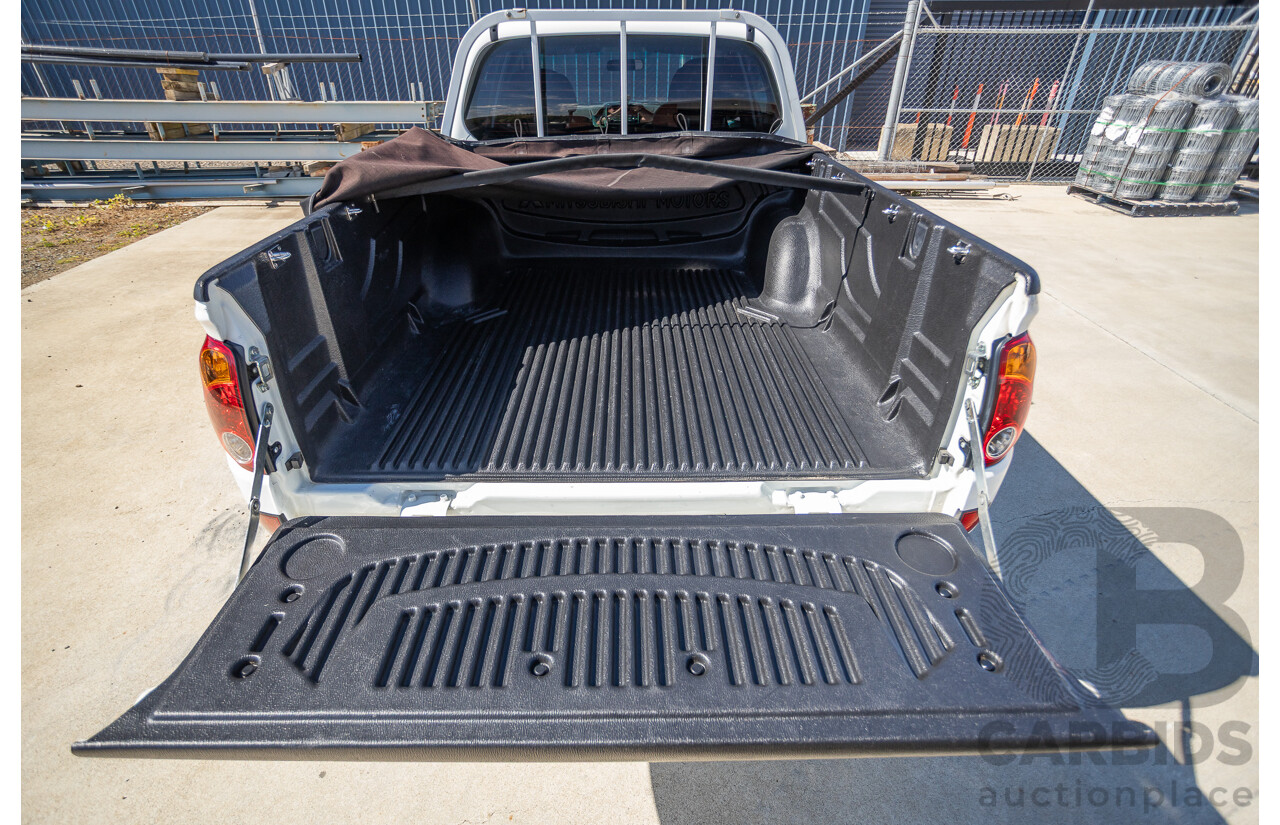 04/2015 Mitsubishi Triton GLX (4x4) MY15 Double Cab Utility White Turbo Diesel 2.5L