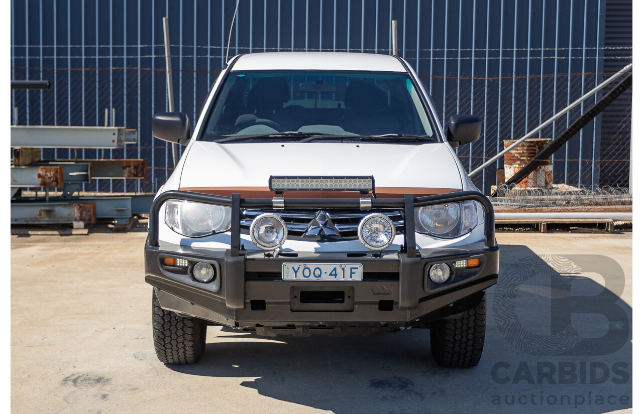 04/2015 Mitsubishi Triton GLX (4x4) MY15 Double Cab Utility White Turbo Diesel 2.5L