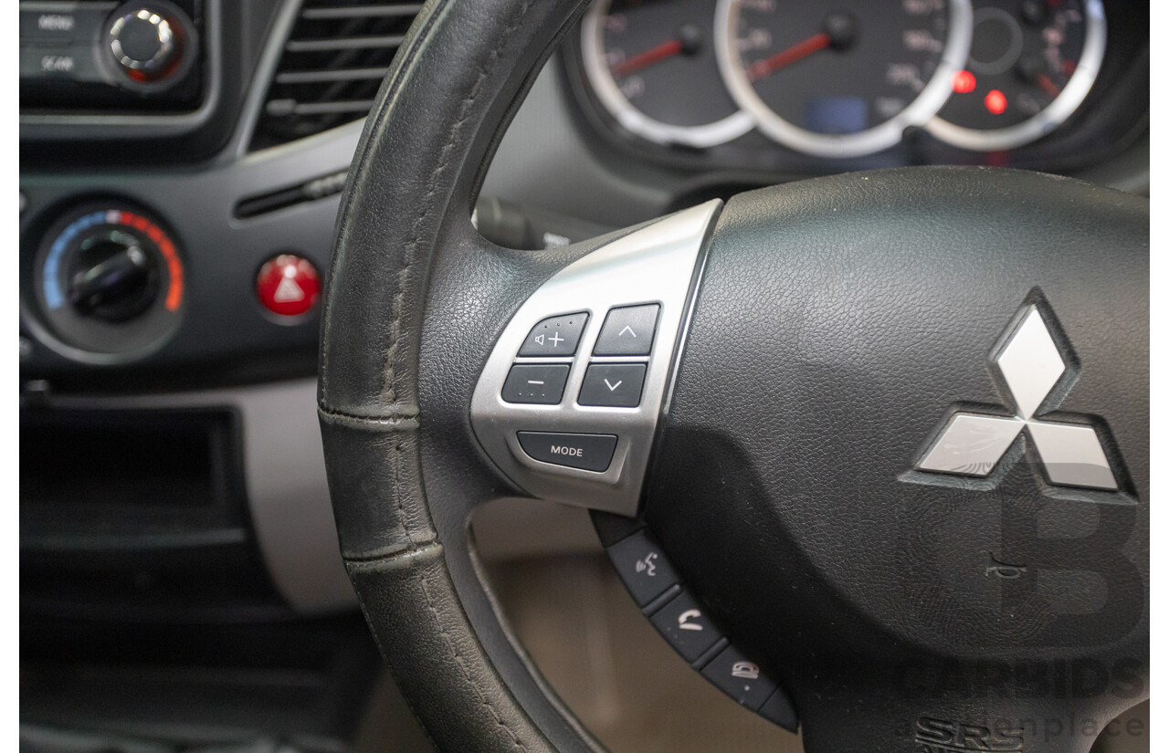 04/2015 Mitsubishi Triton GLX (4x4) MY15 Double Cab Utility White Turbo Diesel 2.5L