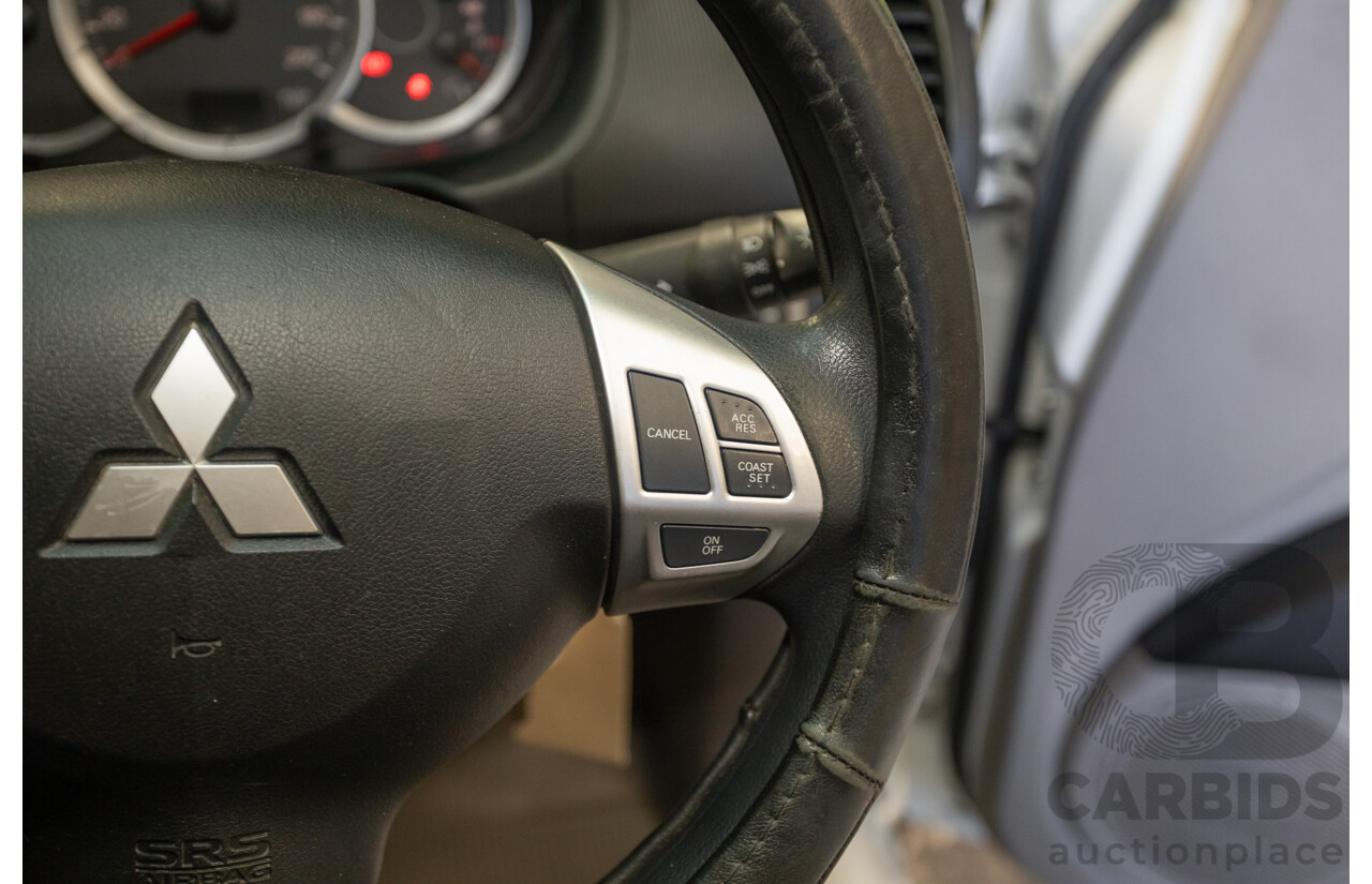 04/2015 Mitsubishi Triton GLX (4x4) MY15 Double Cab Utility White Turbo Diesel 2.5L