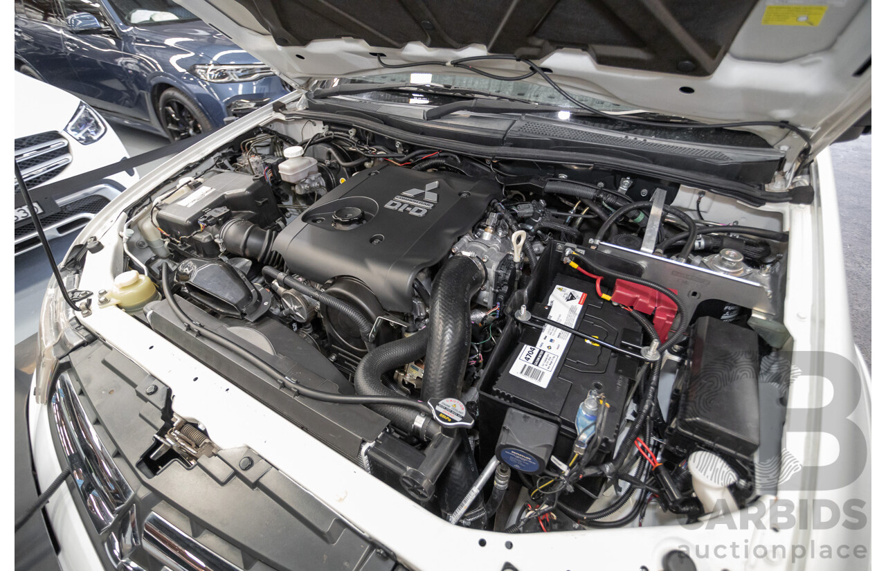 04/2015 Mitsubishi Triton GLX (4x4) MY15 Double Cab Utility White Turbo Diesel 2.5L