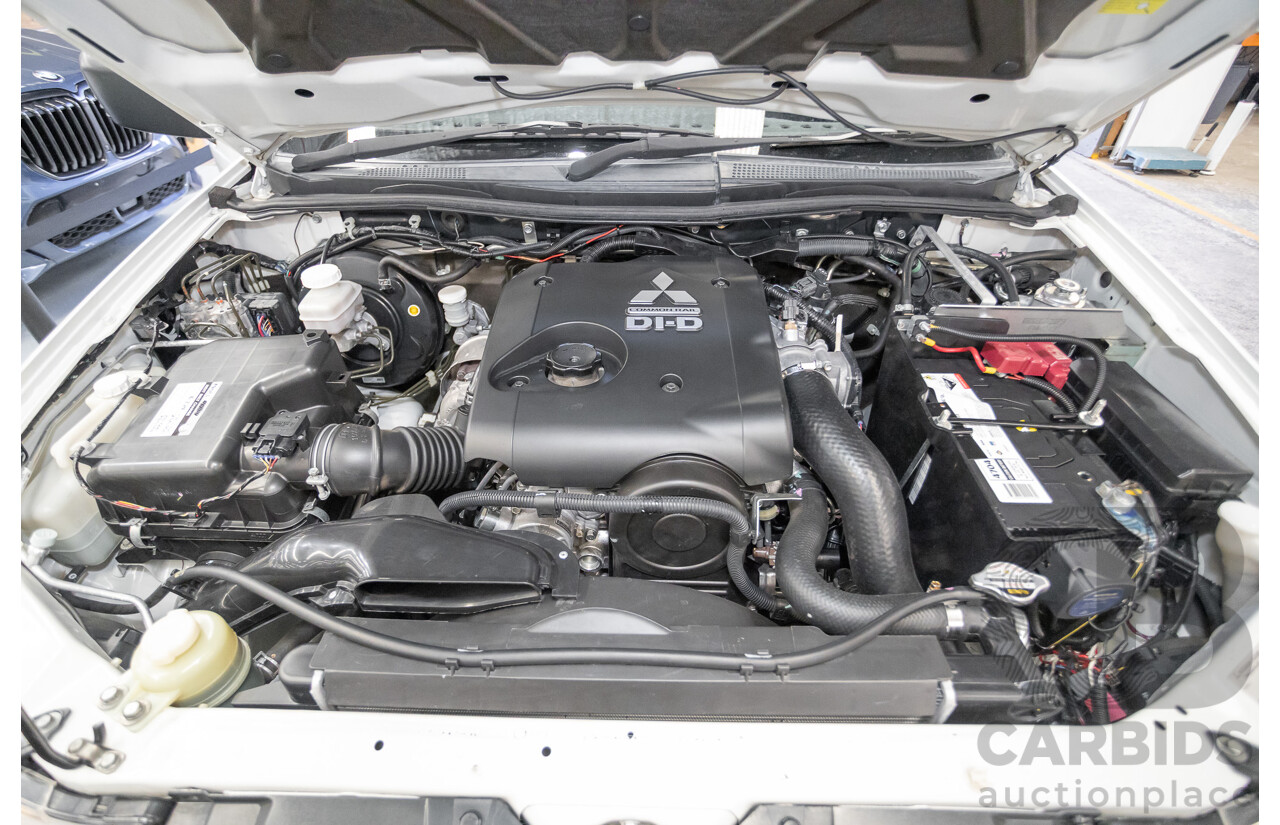 04/2015 Mitsubishi Triton GLX (4x4) MY15 Double Cab Utility White Turbo Diesel 2.5L